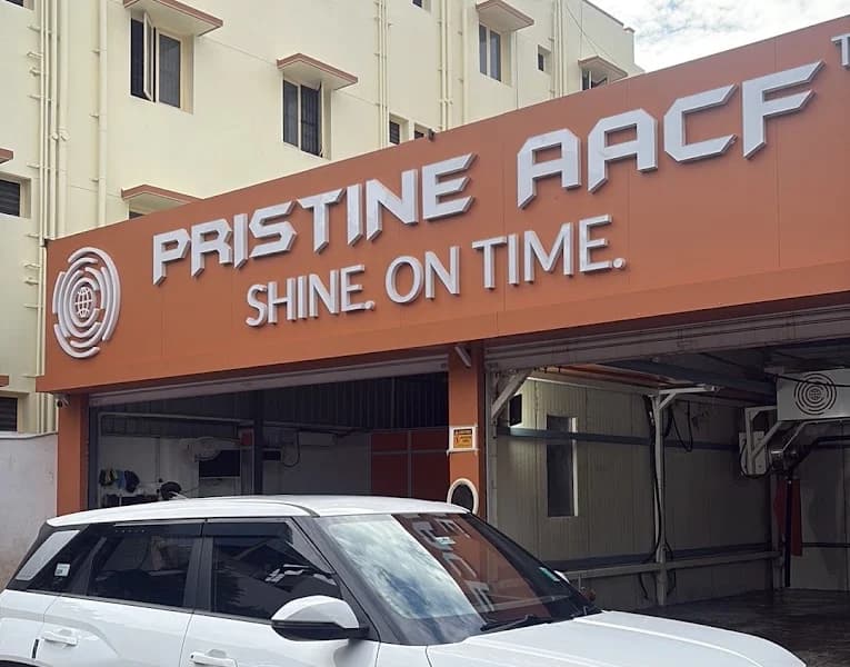 PRISTINE AACF experience-store facade and wash bay in Coimbatore